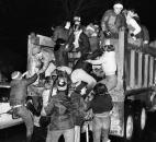 At one point, the leaking Pemberton Dike showed signs of giving way, leading these workers to scramble to a waiting truck to avoid a possible collapse.