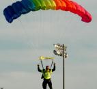 Three sky divers jumped in at the beginning of the Carroll Homecoming football game Friday night. (By Ellie Bogue of The News-Sentinel)