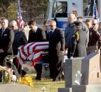 Washington Township volunteer and assistant chief engineer Mark A. Haudenschild II casket is carried to the graveside Saturday, at Riverview Cemetery. Photo by Ellie Bogue