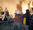 Parents had their children photographed with a Santa's helper as they waited for the Santa display to be lighted. Photo by Ellie Bogue
