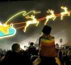 The crowd watches in awe as once again Santa and his reindeer climb toward the sky after they were lit. Photo by Ellie Bogue