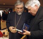 Aram I, the spiritual leader of the Holy See of Cilicia of the Armenian Apostolic Church, made a visit to Fort Wayne hosted by Zohrab and Naomi Tazian in December 2006. Aram I accepts a gift from Bishop John D'Arcy after a luncheon at the Tazian house - a book of writings by Pope Benedict. News-Sentinel file photo
