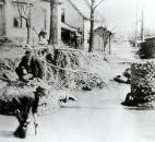 Sidewalks along St. Joe Boulevard were washed away, exposing pipes and an old cistern. (Photo courtesy of The History Center)
