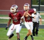 Concordia Lutheran’s David Morrison, right, looks for someone to pass to Friday as Michael Hicks gets ready to block. The Cadets beat Northrop 28-21 at Zollner Stadium. (By Don Converset of The News-Sentinel)