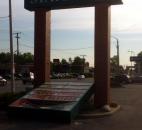 A sign falls in the Statewood Plaza on State and Coliseum. (Photo by Brad Saleik)