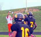 Northrop’s Amani Ray, left, leaps to make a touchdown catch against Snider on Friday, Aug. 31, 2012. The Bruins lost the game however 48-14. (Photo by Don Converset of The News-Sentinel)