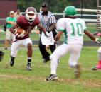 Concordia Lutheran’s Marq Rogers, left, looks for running room against South Side’s William Tolbert during their game Friday at Zollner Stadium. (Photo by Don Converset of The News-Sentinel)