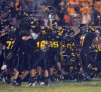 Snider celebrates their victory over Bishop Luers Friday night during their home opener. Snider won by a narrow margin, 10-7. (By Ellie Bogue of The News-Sentinel)