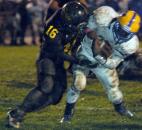 Homestead’s Frank Martin scores a touchdown in the the third quarter of play Friday night, despite Snider’s Jalen McIntosh’s attempt to slow him down.Snider beat Homestead Friday night 30-20. (By Ellie Bogue of The News-Sentinel)