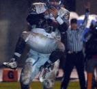 Homestead’s Frank Martin celebrates his touchdown in the In the second quarter, which put Homestead on the scoreboard for the first time in the game. Snider beat Homestead Friday night 30-20. (By Ellie Bogue of The News-Sentinel)