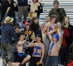 Bishop Dwenger’s student section was sporting a few early Halloween costumes at Friday night’s game against Columbia City. The Saints prevailed beating Columbia City 36-14. (By Ellie Bogue of The News-Sentinel)