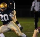 Bishop Dwenger’sD’Marcus Moon runs in the second touchdown of the game, in the first quarter, against Columbia City Friday night. Bishop Dwenger won the game 36-14 (By Ellie Bogue of The News-Sentinel)
