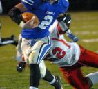 Carroll's Anthony Tranquill runs the ball in for Carroll's first touchdown of the game in the second quarter against South bend Adams Friday night at Carroll High School. Carroll won 44-35. Photo by Ellie Bogue of The News-Sentinel
