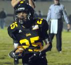 Tyrell Swain smiles after running in the first touchdown for Snider of the  game in the first quarter of play. Snider beat Merrillville, 42-39, and will advance to IHSAA State finals next weekend in Indianapolis. Photo by Ellie Bogue