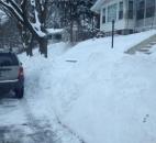 Snow is piled up along a Fort Wayne street Wednesday afternoon. (Photo by Lisa Esquivel Long of The News-Sentinel)