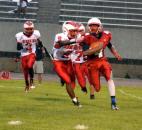 North Side junior Tyvon Kelly chases down Wayne’s Terrance Fincher on a punt. (Photo by Blake Sebring of The News-Sentinel)