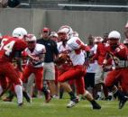 North Side running back Anthony Linnear is gang tackled by Wayne’s JocQuaylin Thomas, No. 95, and DaQuan Coates, No. 54. (Photo by Blake Sebring of The News-Sentinel)