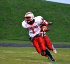 North Side’s C.J. Jackson is dragged down from behind by Wayne’s JocQuaylin Thomas during the first quarter Friday night. (Photo by Blake Sebring of The News-Sentinel)