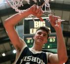 Mark Richardson cuts the net in celebration after Bishop Dwenger defeated North Side 63-61 in the 1994 sectional finals at Memorial Coliseum. With less than three seconds remaining in the game, Richardson hit the game-winning shot to give Bishop Dwenger its third sectional title and first since 1989. Mark Richardson cuts the net in celebration after Bishop Dwenger defeated North Side 63-61 in the 1994 sectional finals at Memorial Coliseum. With less than three seconds remaining in the game, Richardson hit the game-winning shot to give Bishop Dwenger its third sectional title and first since 1989.