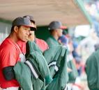 The TinCaps’ Gabriel Quintana watches the game from the dugout. (Photo by Gannon Burgett for The News-Sentinel)
