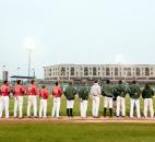 The TinCaps' lineup looks toward the flag during the national anthem. (Photo by Gannon Burgett for The News-Sentinel)