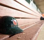 A TinCaps helmet sits covered in rain during the 20-minute rain delay that turned into an early ending. (Photo by Gannon Burgett for The News-Sentinel)