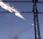 In this photo taken with a mobile phone camera, a meteorite contrail is seen Friday over Russia's Chelyabinsk region.