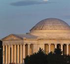 A full moon rises behind the Jefferson Memorial in Washington on Saturday. A full moon rises behind the Jefferson Memorial in Washington on Saturday.