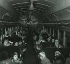 Guest of Wolf & Dessauer Department Store's Santa Claus meet and greet wait in a train car at the Baker Street Station on Nov. 23, 1956. (Photo courtesy of The Allen County Public Library)