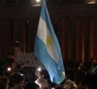 Catholic faithful wave an Argentine flag in St. Peter's Square at the Vatican on Wednesday. Argentine Cardinal Jorge Bergoglio, who chose the name of Francis, was elected as the 266th pontiff of the Roman Catholic Church. (Photo by The Associated Press)