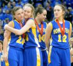 Homestead's Savannah Buck, Madisen Parker, Josie Fisher and Karissa McLaughlin stand on the winners platform after receiving their runner up medals Saturday night. Homestead fell in their bid for  the 4A State Finals Girls Basketball title.