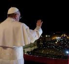 In this photo provided by the Vatican newspaper L'Osservatore Romano, Pope Francis looks out at the crowd Wednesday from the central balcony of St. Peter's Basilica at the Vatican. (Photo by L'Osservatore Romano)
