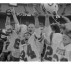 Whitko players celebrate on the field of the Hoosier Dome after shutting out Tell City 26-0 in the 1986 Class 2A state finals in Indianapolis. Whitko finished the year undefeated and was the first Class 2A school in the state to win 14 games in a single season as it won the school's only football state championship. (News-Sentinel file photo)