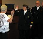 City Clerk Sandra Kennedy, left, formally swears into office new Fort Wayne Fire Chief Amy Biggs in a ceremony Monday. Biggs is the first female chief in the department's 173-year history. Mayor Tom Henry named her last month as the successor to former chief Pete Kelly, who announced his retirement earlier this year and officially left the department Friday. Photo by Christian Sheckler