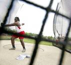 Jari Dada of Wayne spins to gain momentum as he attempts his first discus throw in the finals. (Photo by Gannon Burgett for The News-Sentinel)