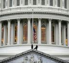The American flag on the East Front of the U.S. Capitol is lowered to half-staff Monday on Capitol Hill. Photo by By The Associated Press
