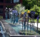Water sprays through a sculpture of irises outside the visitors center at the Sarah P. Duke Gardens at Duke University in Durham, N.C.  (Photo by Lisa Esquivel Long of The News-Sentinel) 