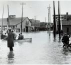 Evacuees traveled by boat on Wells Street north of the bridge. (News-Sentinel file photo)