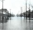 Looking toward downtown, water from the St. Marys River flooded West Main Street. (News-Sentinel file photo)