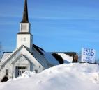 A huge pile of snow sits at Robinson Chapel Church at the corner of Tonkel and Union Chapel roads last week. "We've received so much snow, there is just no place to put it anymore!" wrote Deb Argast of Garrett in an email. So the church has found a way to "greet God's abundant snow blessings with a sense of humor," she said of the sign posted that reads, "Free snow//Help yourself." (Photo courtesy of Deb Argast via email)