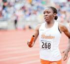 Northrop's Latrice Bolton looks for her teammate during the 3,200-meter relay race. (Photo by Gannon Burgett for The News-Sentinel)
