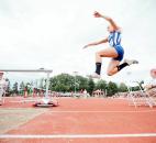 Homestead's Ari Nelson leaps during the during the long jump competition. (Photo by Gannon Burgett for The News-Sentinel)