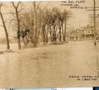 Along St. Joe Boulevard, water poured over the Lakeside dike. (Photo courtesy of the Harter Postcard Collection/ACPL)