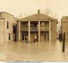 Residents of the Flats viewed the flooding from the second stories of their homes. (Photo courtesy of the Harter Postcard Collection/ACPL)