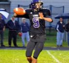 Leo senior quarterback Sam Waters looks for an open receiver. (By Blake Sebring of The News-Sentinel)