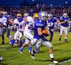 Carroll’s Drue Tranquill runs down the sidelines in the second quarter Friday night to set up the Chargers’ second touchdown against Homestead. (By Blake Sebring of The News-Sentinel)