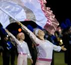 The Carroll band color guard shows off their flag handling skills during the half-tme show Friday night at Carroll High School. (By Ellie Bogue of The News-Sentinel)