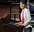 Nobel Peace Prize winner and world leader Aung San Suu Kyi speaks to the crowd Tuesday morning at Memorial Coliseum. By Ellie Bogue 