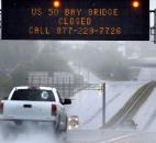 A sign informs motorists along U.S. Route 50 that Maryland's Chesapeake Bay Bridge, which connects the state's eastern and western shores, is closed because of winds from Hurricane Sandy on Monday. 