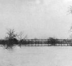 The deck of the old Van Buren Street Bridge sat precariously on the St. Marys River. (Photo courtesy of The History Center)